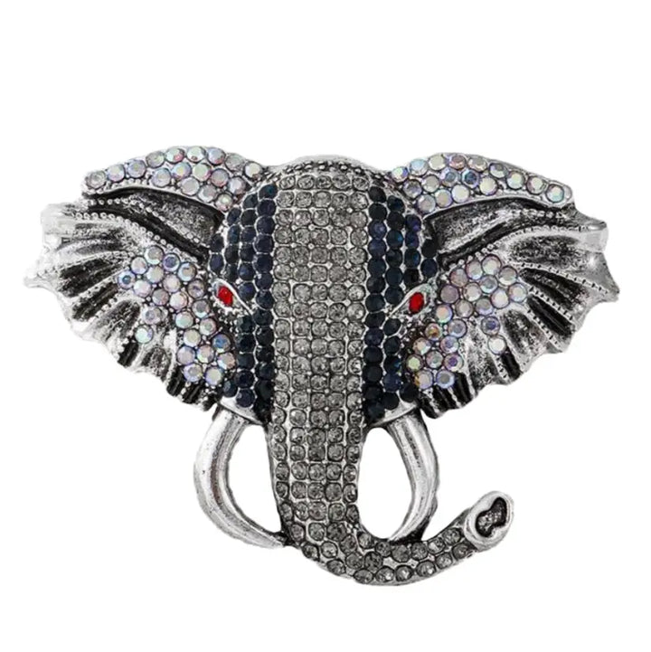 Decorative elephant head with gemstones on a white background