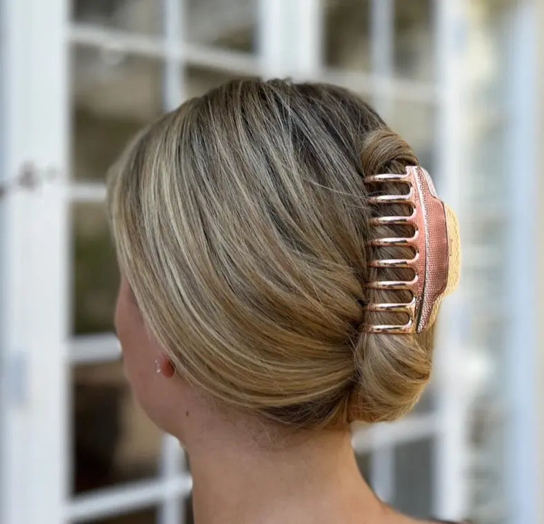 Oversized metal hair claw clip in rose gold