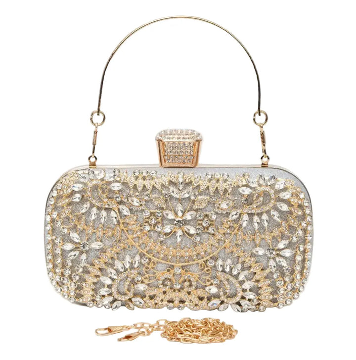 Elegant clutch bag with intricate gold and silver design on a white background