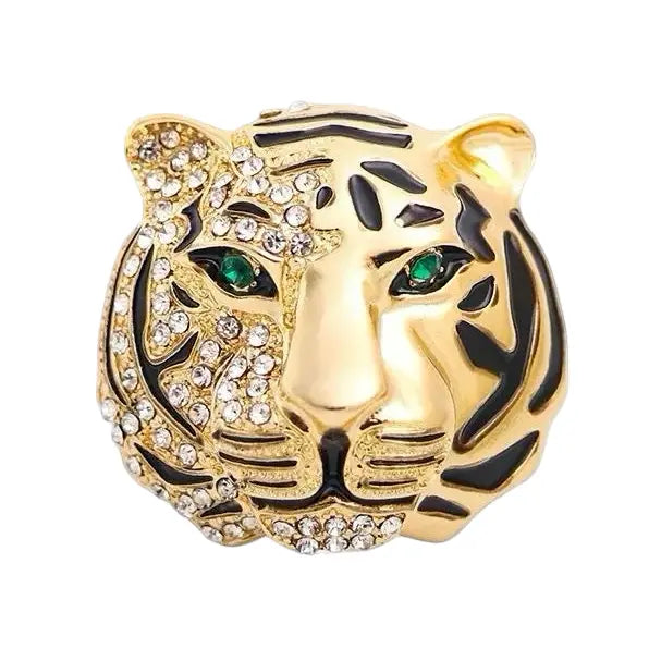 Gold tiger head pendant with green eyes and gemstones on a white background