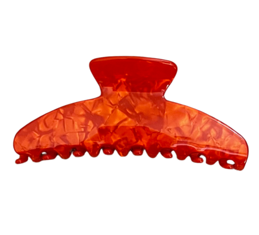 Oversized acetate hair claw in Orange Pearl
