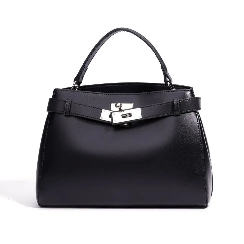 Black handbag with a silver clasp on a white background