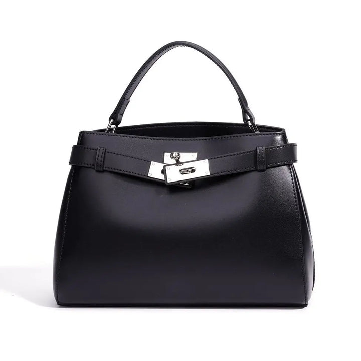 Black handbag with a silver clasp on a white background